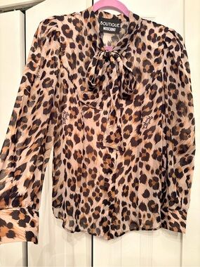 Moschino Leopard Print Tie-Neck Blouse in Beige and Brown, size 6.